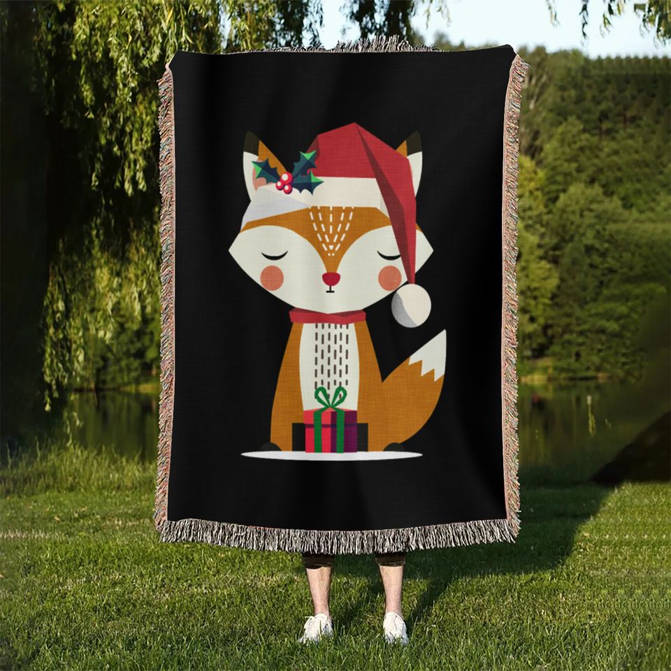 cute fox with santa hat and gift Woven Blankets