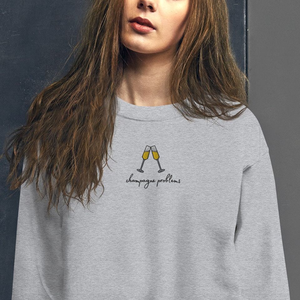 Embroidered Champagne Problems Taylorr Swifts Evermore Unisex Sweatshirt