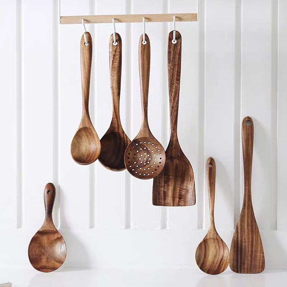 Wooden kitchen utensils set for family cooking