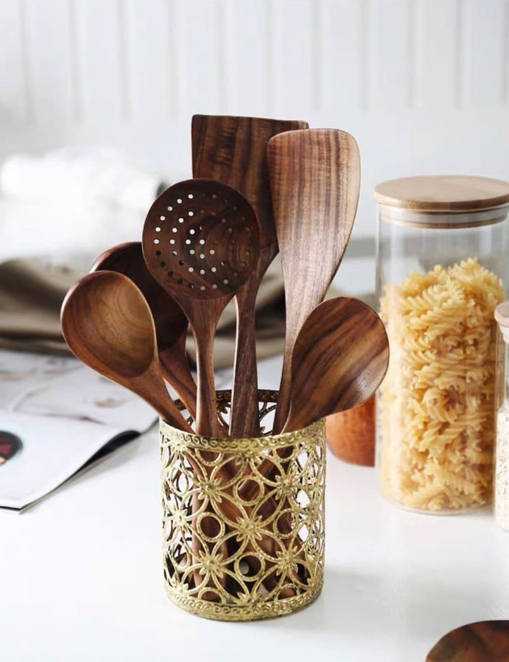 Wooden kitchen utensils set for family cooking