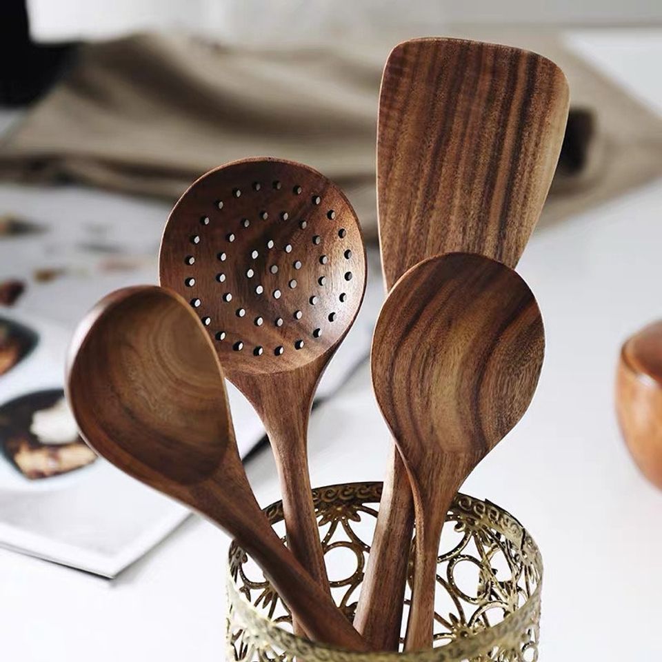 Wooden kitchen utensils set for family cooking