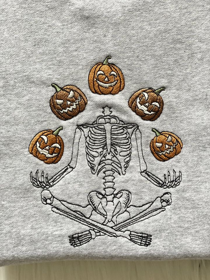 Halloween Meditation Skeleton Embroidered Sweatshirt | Throwing Pumpkin