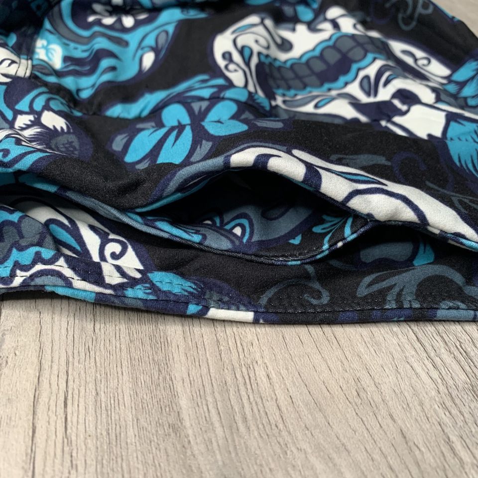 Teal large sugar skull leggings